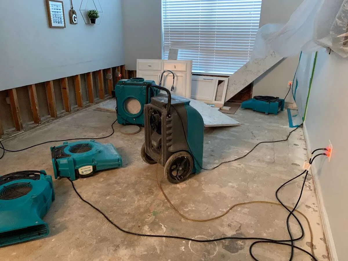 Dehumidifier in flood-cut room for Water Damage Restoration in Bella Vista